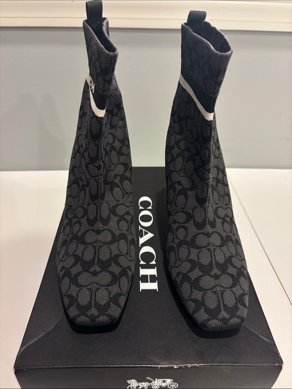 TASHA SIGNATURE Coach Black Logo Knit Sock Ankle Boots with Subtle White Trim